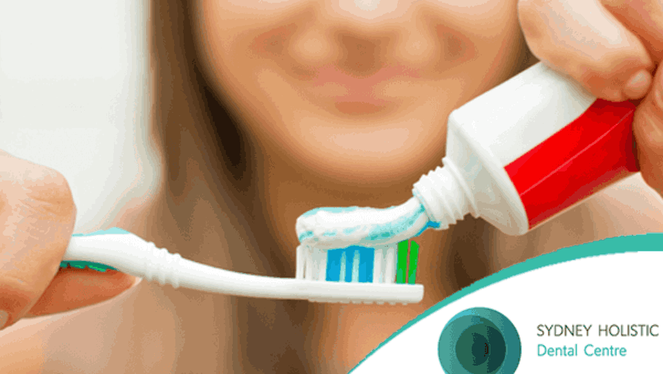 women using tooth brush